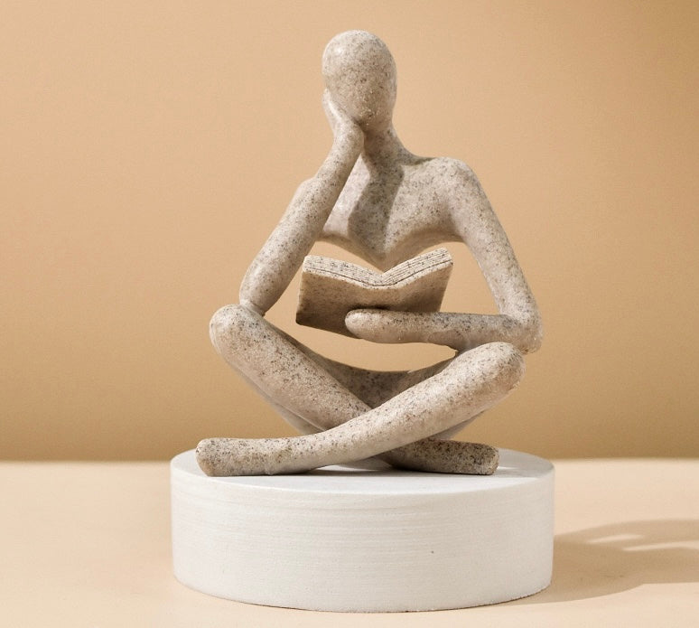 Beige Thinker Statue