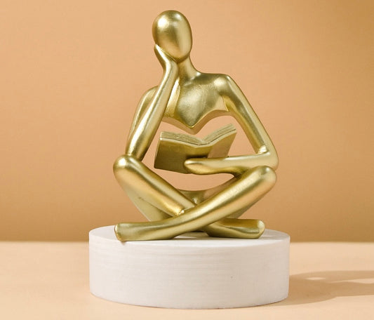Beige Thinker Statue