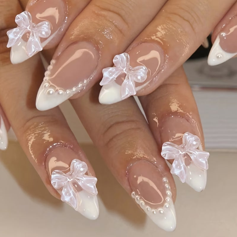 White gradient pearl bow nails